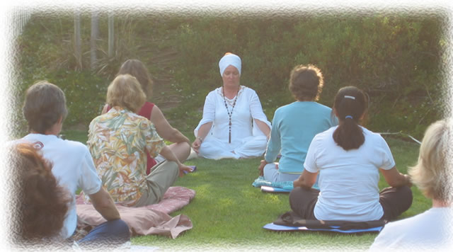 Atma leading outdoor yoga